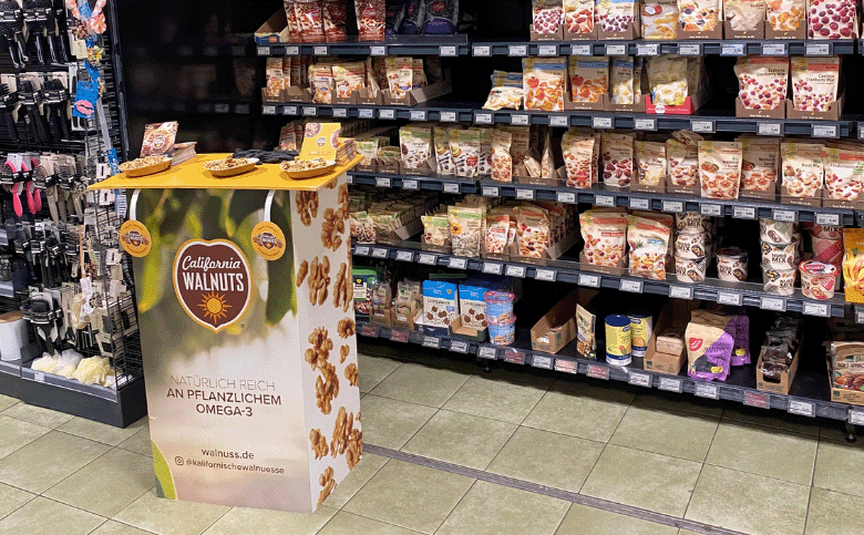 promotional stand in the supermarket in front of nut packages